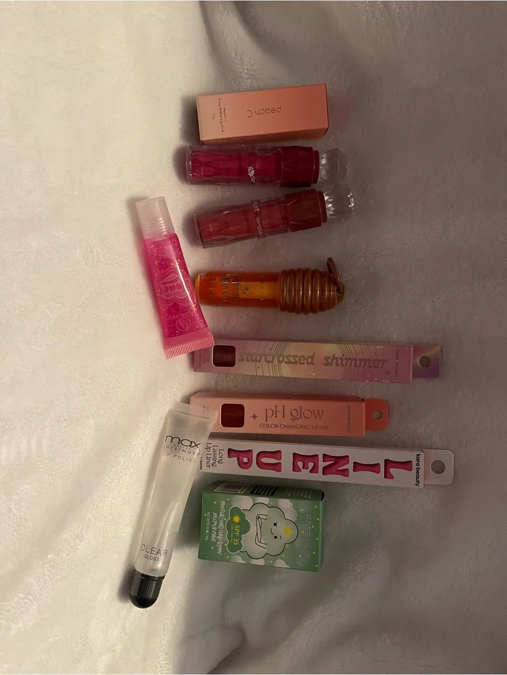 Assorted Women’s Lip Gloss & Balm Set in Pink and lip liner and lip stick